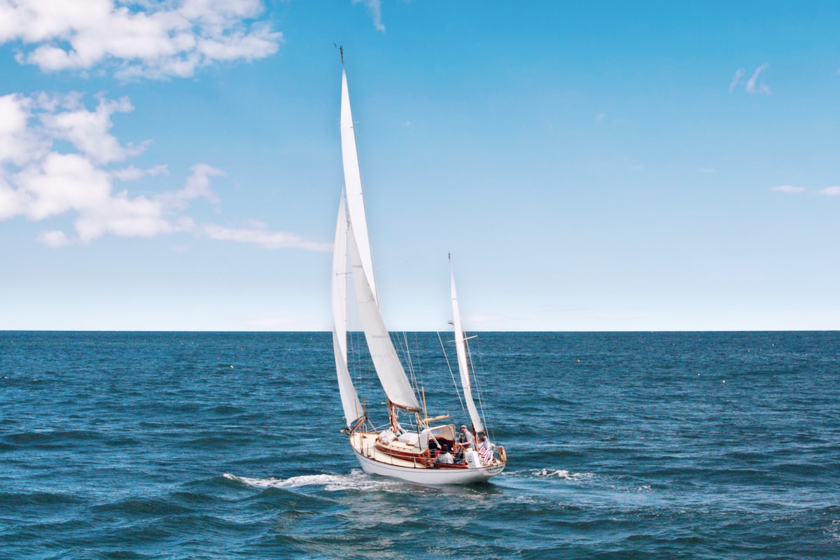 Yacht vs Villa: What's Better for a Luxury Holiday in the South of France? Luxury yacht sundeck with loungers overlooking the French Riviera coastline