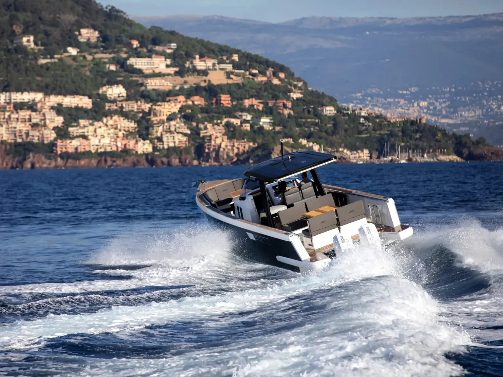 Global Superyacht Charter Guide: Mediterranean, Caribbean & Beyond Luxury superyacht cruising in turquoise Mediterranean waters