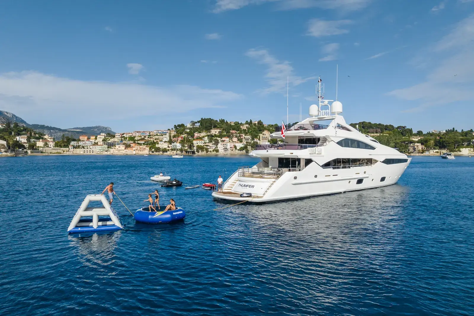 Superyacht anchored with water toys and inflatable playground on the French Riviera