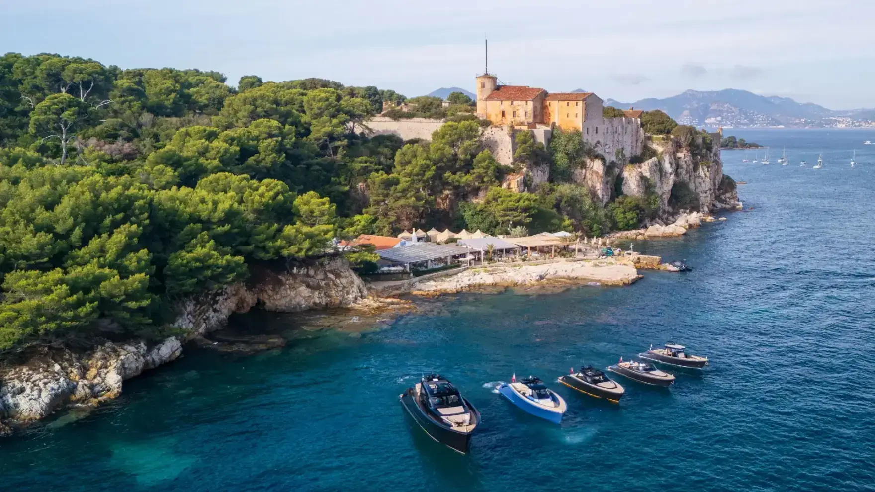 Luxury yacht charter on the French Riviera — Saint-Tropez, Monaco, Cannes Luxury yacht sailing at sunset on the French Riviera