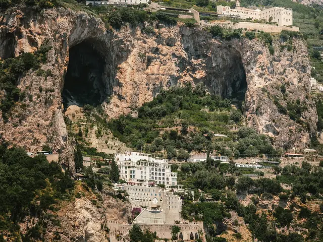 Furore Fjord: Steep Amalfi Coast cliffs with sea caves