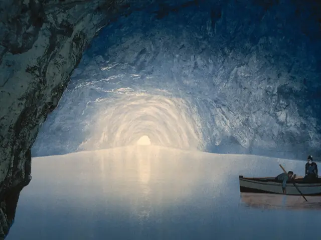 Blue Grotto (Grotta Azzurra): Rowing boat inside the Blue Grotto, Capri (archival image)
