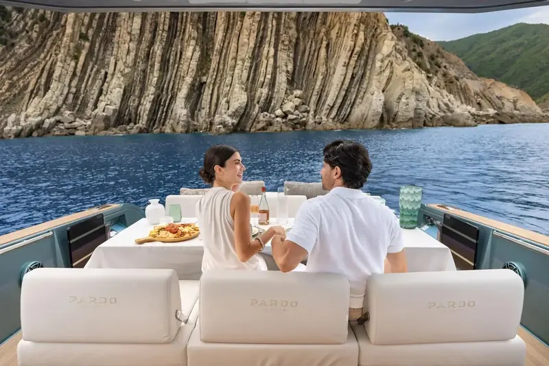 Guests having lunch on deck at anchor