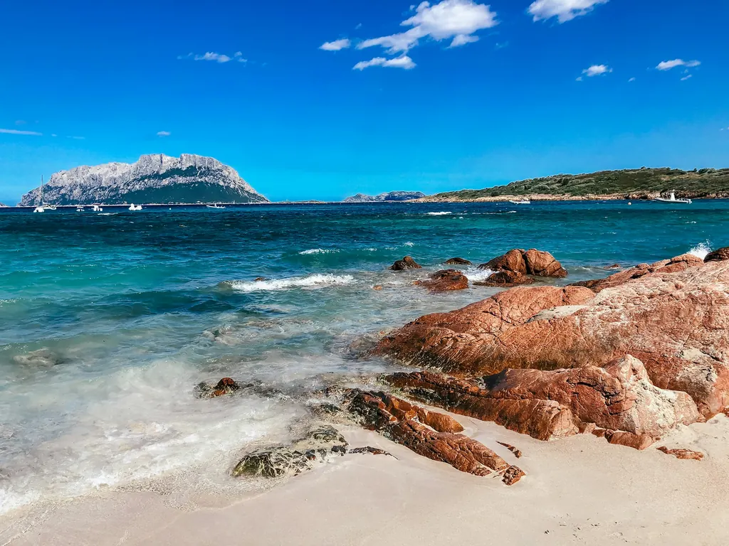 Day 1: Clear water and red granite rocks on the Sardinian coast
